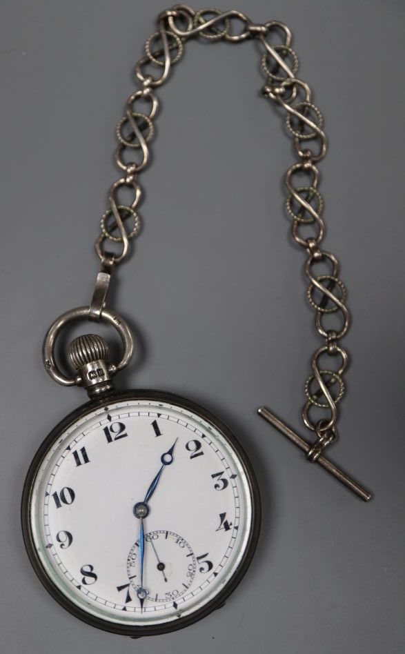 A 1920s silver open face Record keyless lever pocket watch, with a white metal albert, case diameter 48mm.